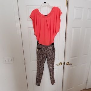 Peach blouse and leopard print pants